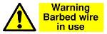 Warning Barbed wire in use